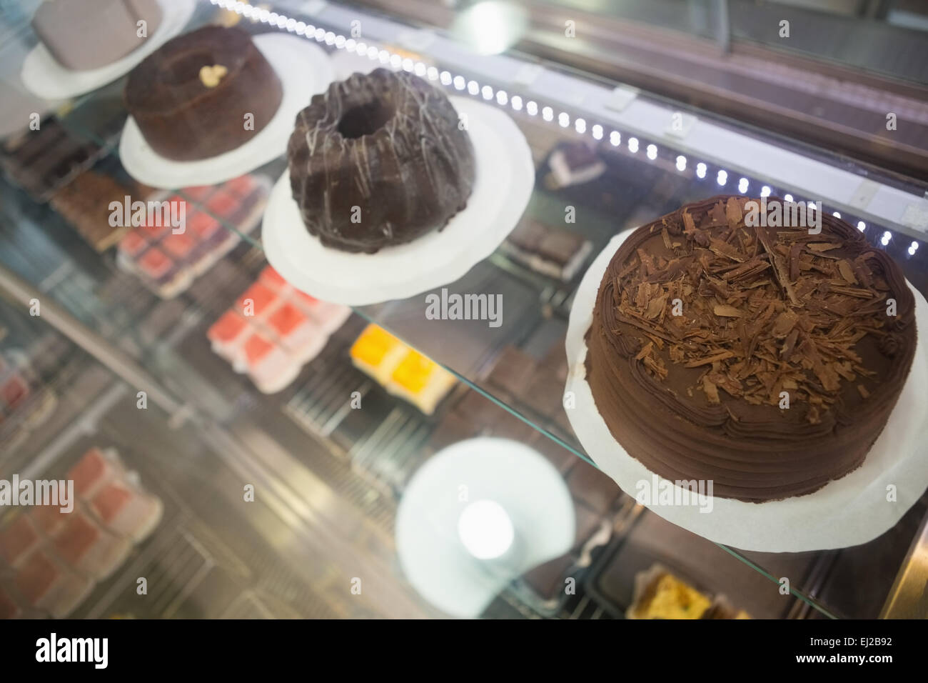 Display case with chocolate cakes Stock Photo