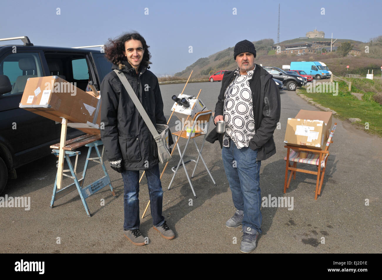 A man and his son with home made equipment to see the solar eclipse in Falmouth, Cornwall, UK Credit:  Stephen Parker/Alamy Live News Stock Photo
