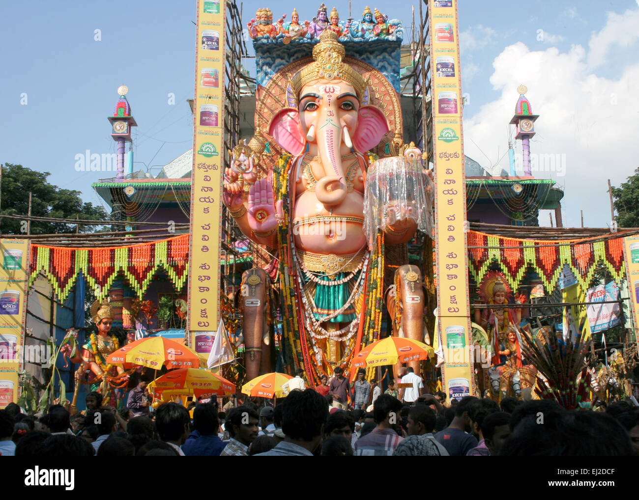 People pray to 58 feet high Lord Ganesh idol, at Khairatabad, during Hindu festival on September 28,2012 in Hyderabad,India. Stock Photo