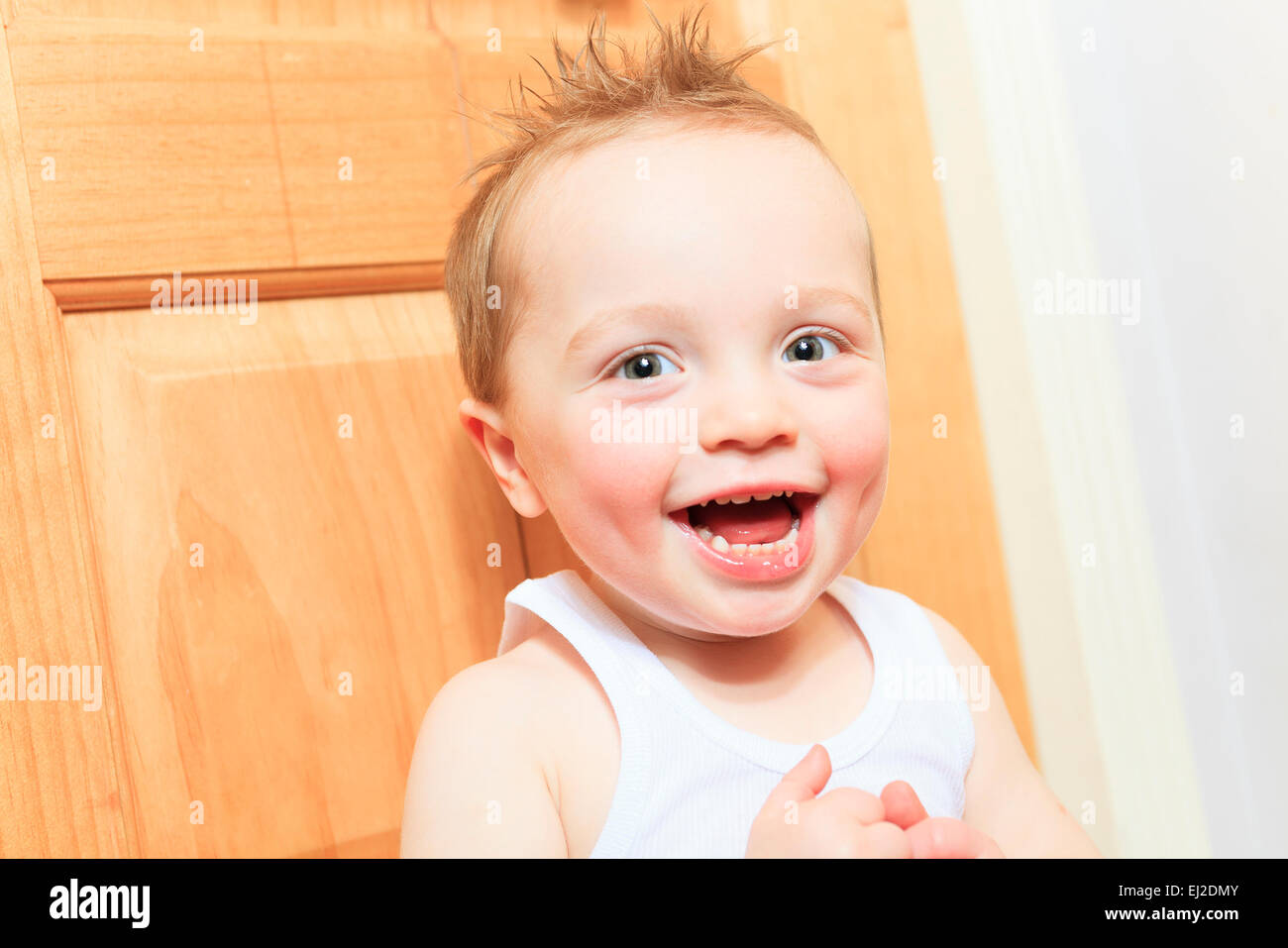 Happy 2 years old baby boy. Kid is smiling, grinning. Stock Photo