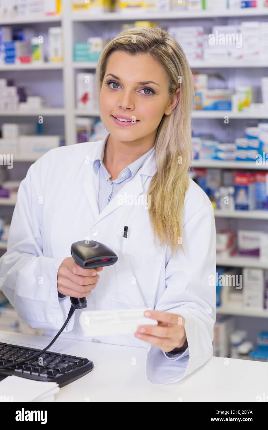 Pharmacist scanning medicines Stock Photo Alamy