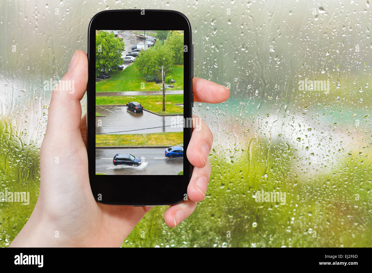 Rainy city view from window hi-res stock photography and images - Alamy