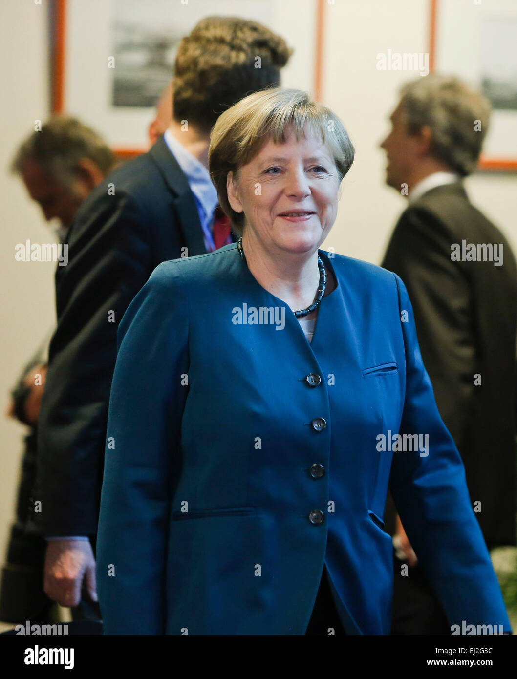 Brussels, Belgium. 20th Mar, 2015. German Chancellor Angela Merkel arrives to attend a press conference after the European Union (EU) summit at the EU headquarters in Brussels, Belgium, on March 20, 2015. European leaders agreed to create an Energy Union during a summit meeting in Brussels and set out the first steps by accelerating the connection of national pipelines and electricity grids. Credit:  Zhou Lei/Xinhua/Alamy Live News Stock Photo