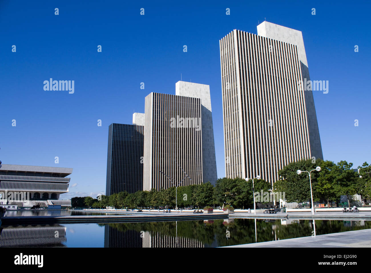 New York state agency office building towers and the legislative office building on the left in Albany, NY. Stock Photo