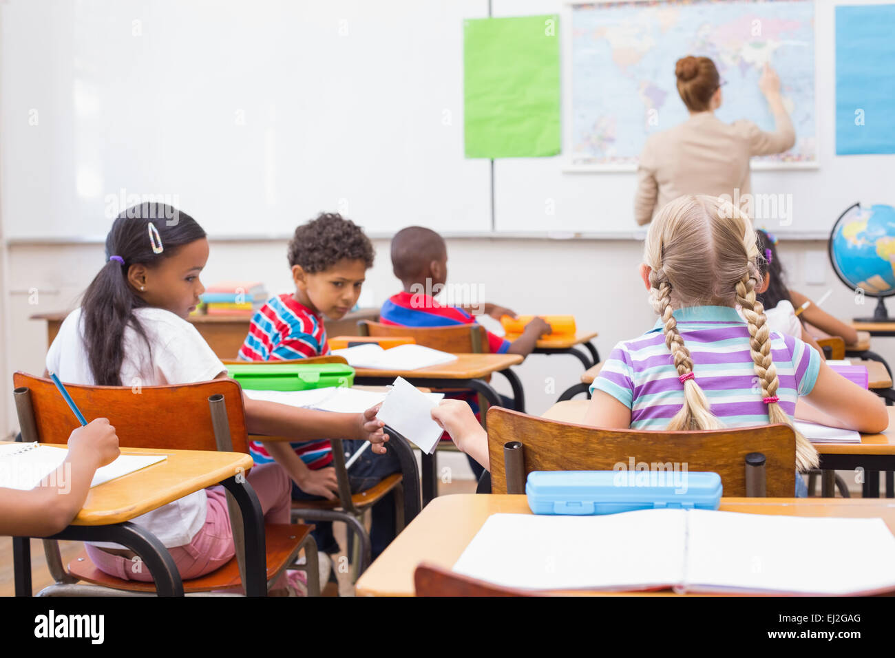 Naughty pupil in class Stock Photo