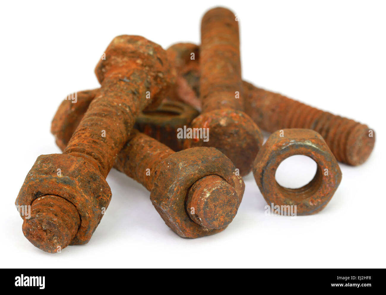 Rusty bolt and nut over white background Stock Photo