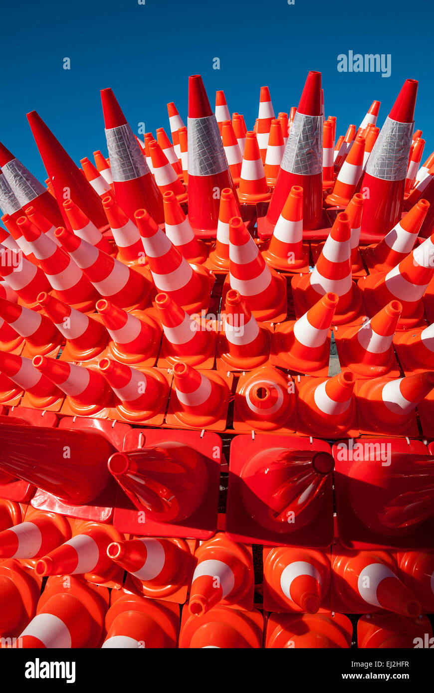 A large number of networked traffic cones to mark the road. Stock Photo