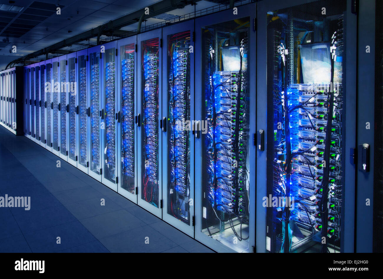Network cabinets with server racks in a data center. Digital Composite (DC) Stock Photo
