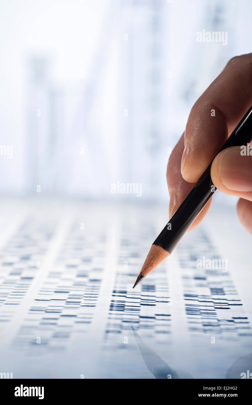 Scientists examined DNA gel that is used in genetics, medicine, biology, pharma research and forensics. Stock Photo