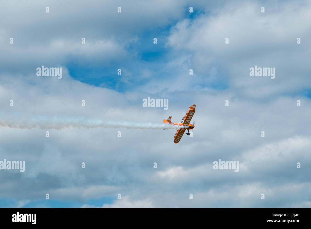 ASCOT, UK - AUGUST 16, 2014: Wing walking display at the Red Bull Air Race in Ascot, August 16, 2014. Stock Photo