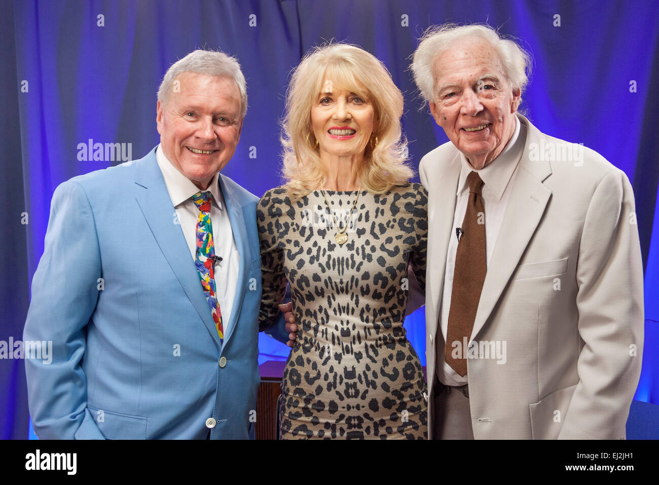 Walsall, West Midlands, UK. 20 March 2015. David Hamilton (L) with English pop singer Julie Rogers (C) and British television producer Johnnie Hamp (R) at a recording of ‘The David Hamilton Show’ for Big Centre TV. Hosted by presenter and broadcaster ‘Diddy’ David Hamilton the show features famous personalities from across the music and television spectrum. Credit:  John Henshall / Alamy Live News PER0519 Stock Photo