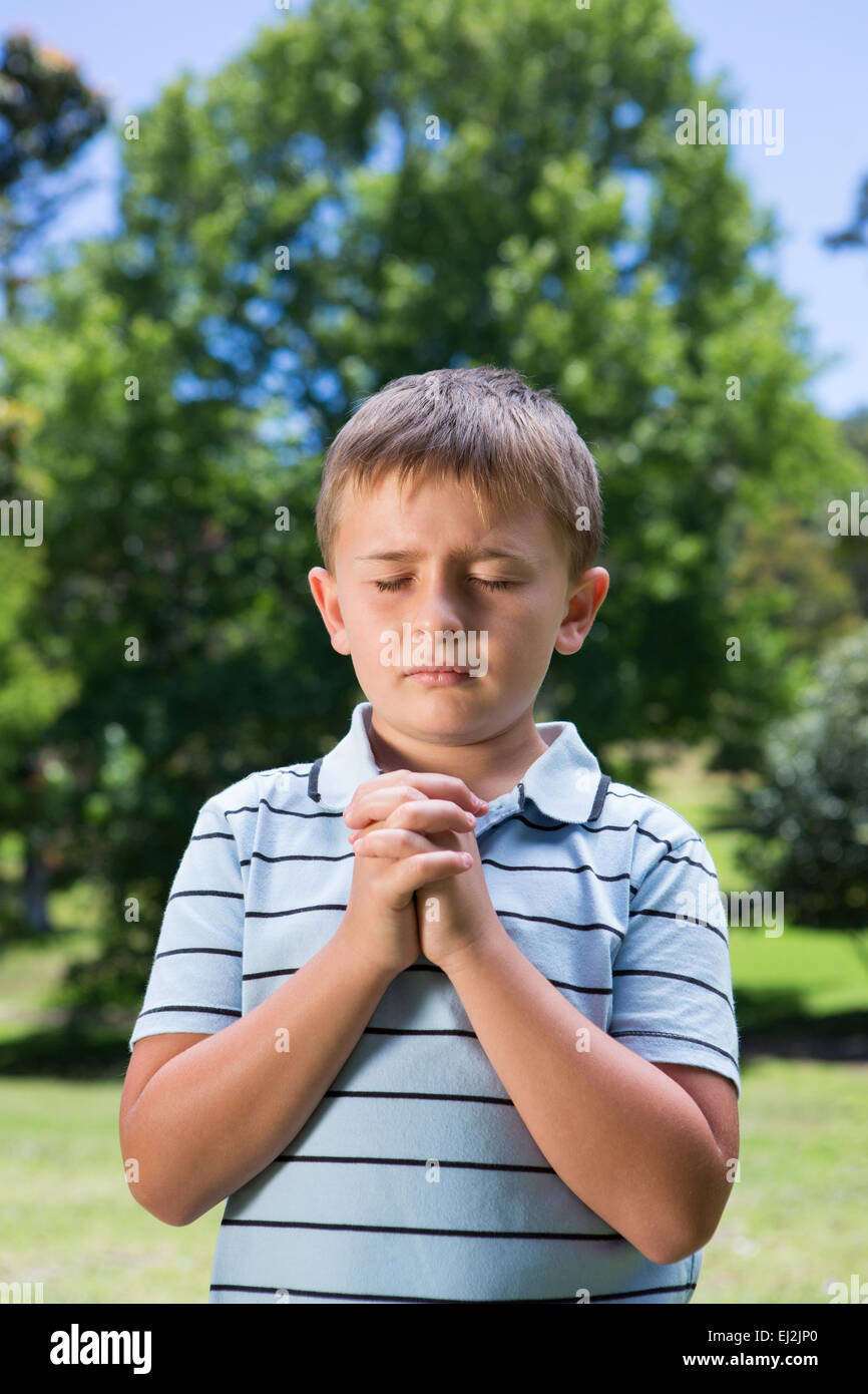 Little boy saying his prayers Stock Photo - Alamy