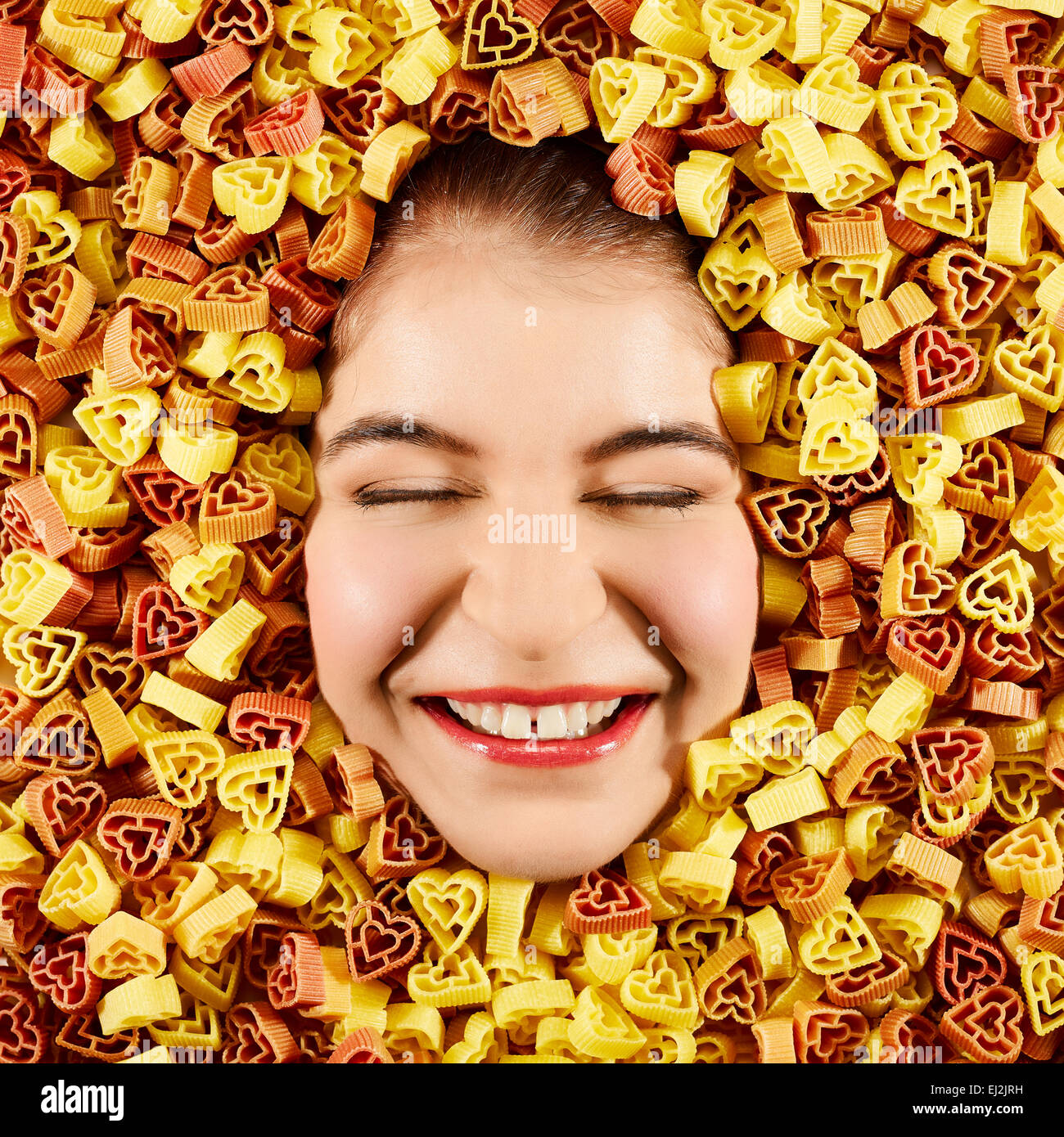 Beautiful woman expression face with tri-color pasta frame Stock Photo