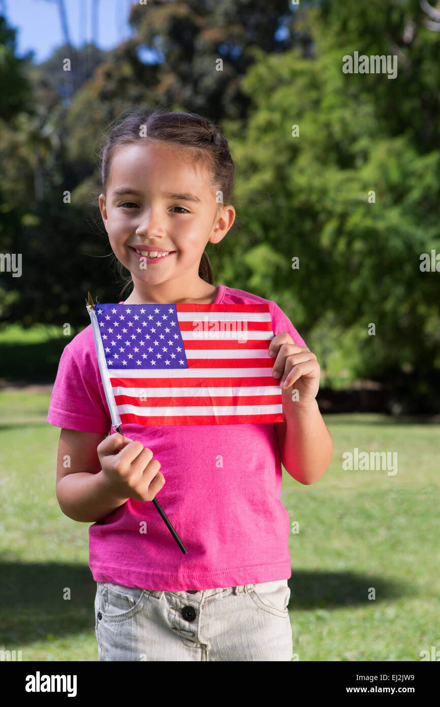 Little girl waving american flag Stock Photo Alamy