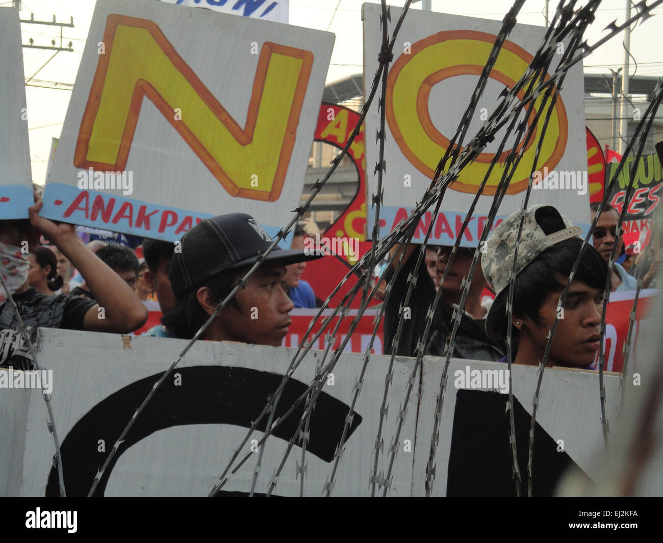Manila, Philippines. 20th Mar, 2015. Filipino activists hold placards calling for the resignation of Philippine President Benigno Aquino III, during a rally at Mendiola. President Aquino is facing calls for his removal over the botched anti-terror operation last January 25 in Mamasapano, Maguindanao to hunt wanted Malaysian bombmaker Zulkifri bin Hir, alias Marwan, that resulted in the deaths of 44 police commandos. Credit:  Richard James Mendoza/Pacific Press/Alamy Live News Stock Photo