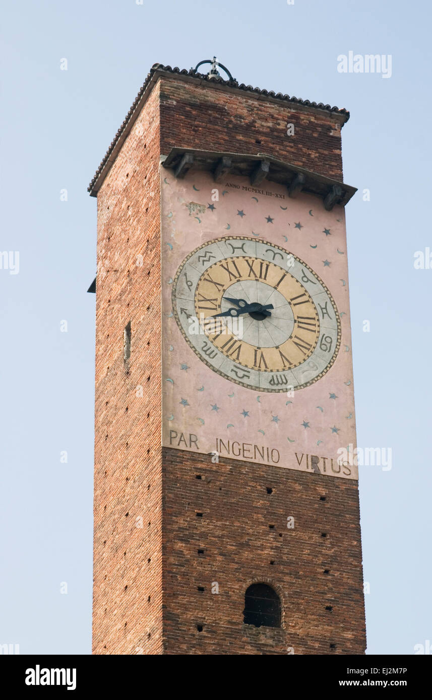 Medieval clock tower in Da Vinci square Pavia, Lombardy, Italy Stock Photo