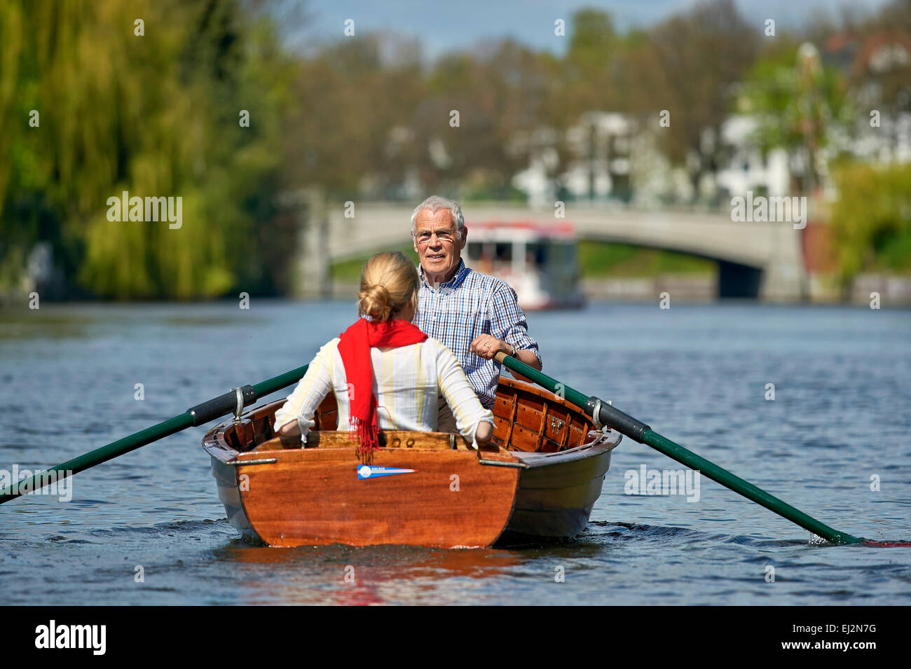 Person rowing a wooden rowboat hires stock photography and images Alamy