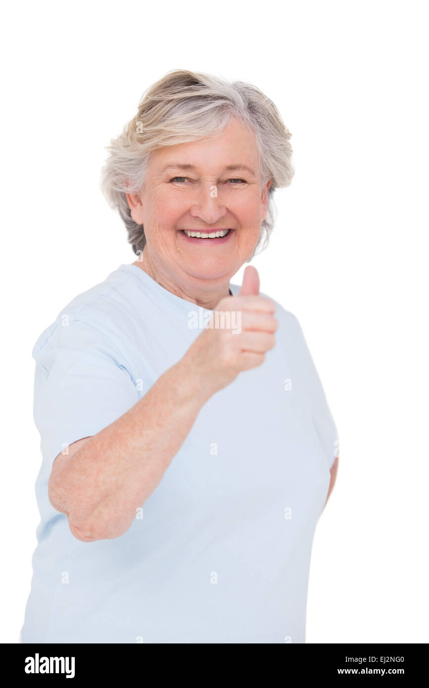 Senior woman showing thumbs up Stock Photo - Alamy