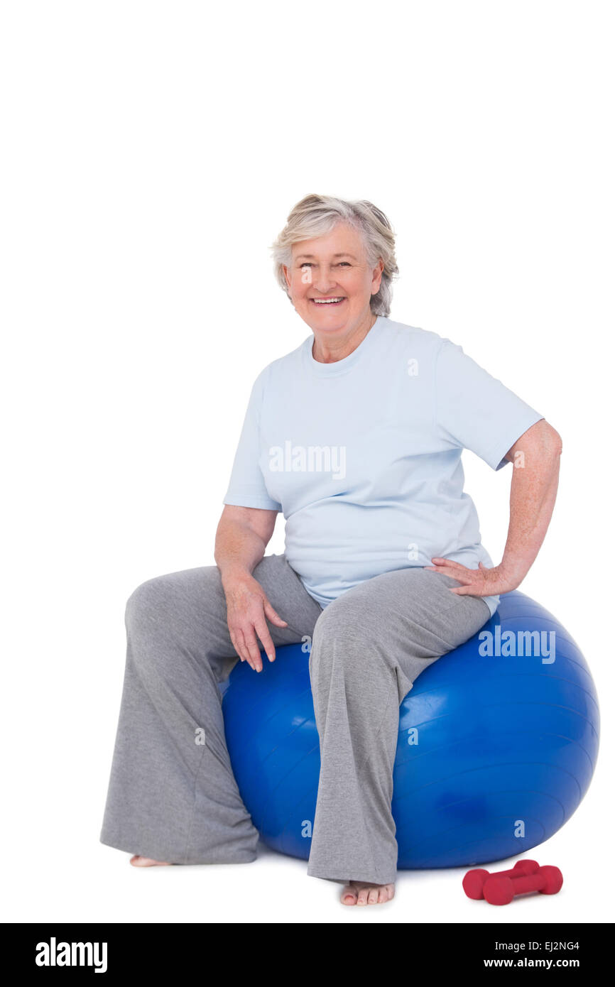 Senior woman sitting on exercise ball Stock Photo Alamy