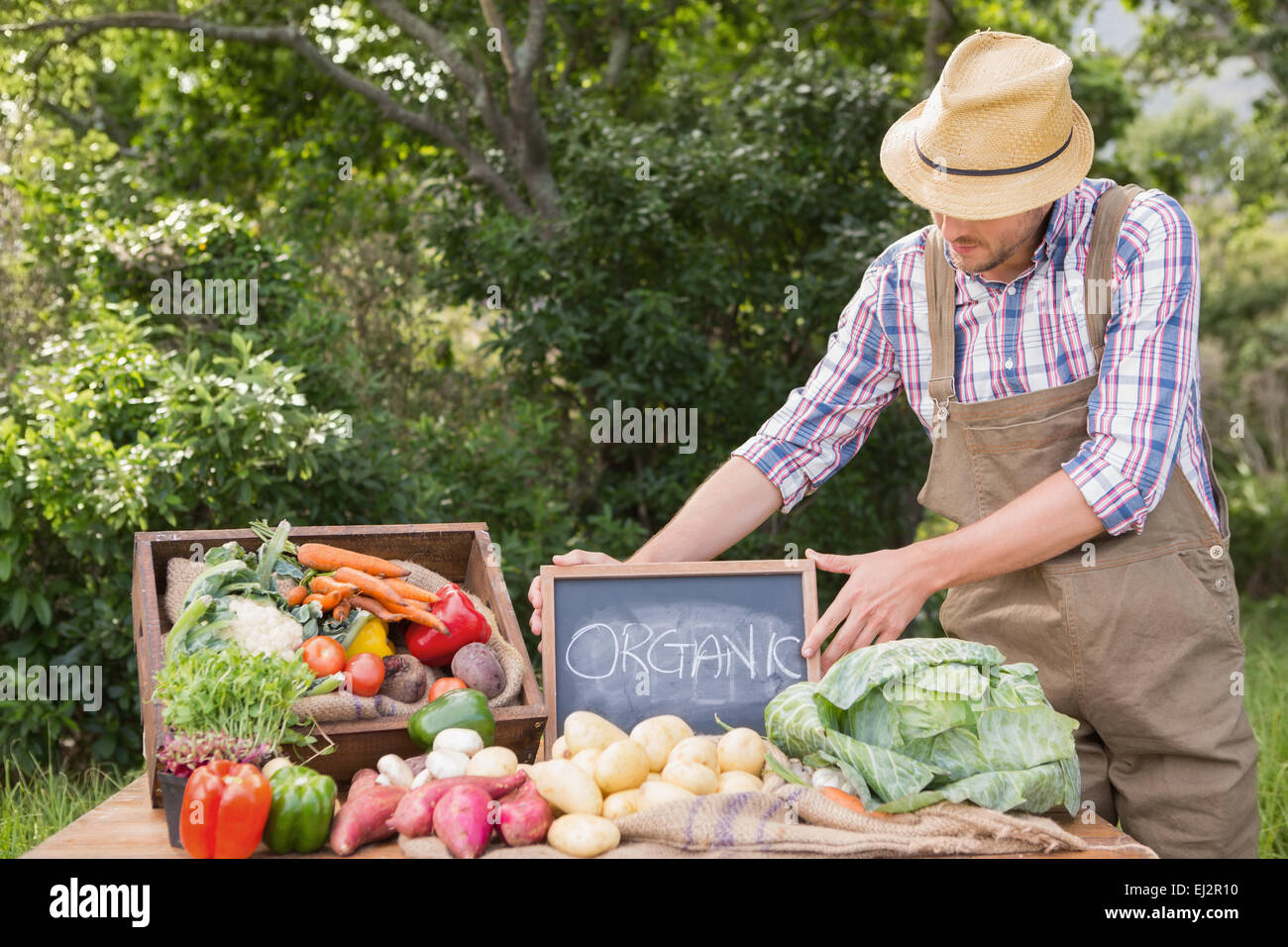 Market green man selling vegetables hi-res stock photography and images ...
