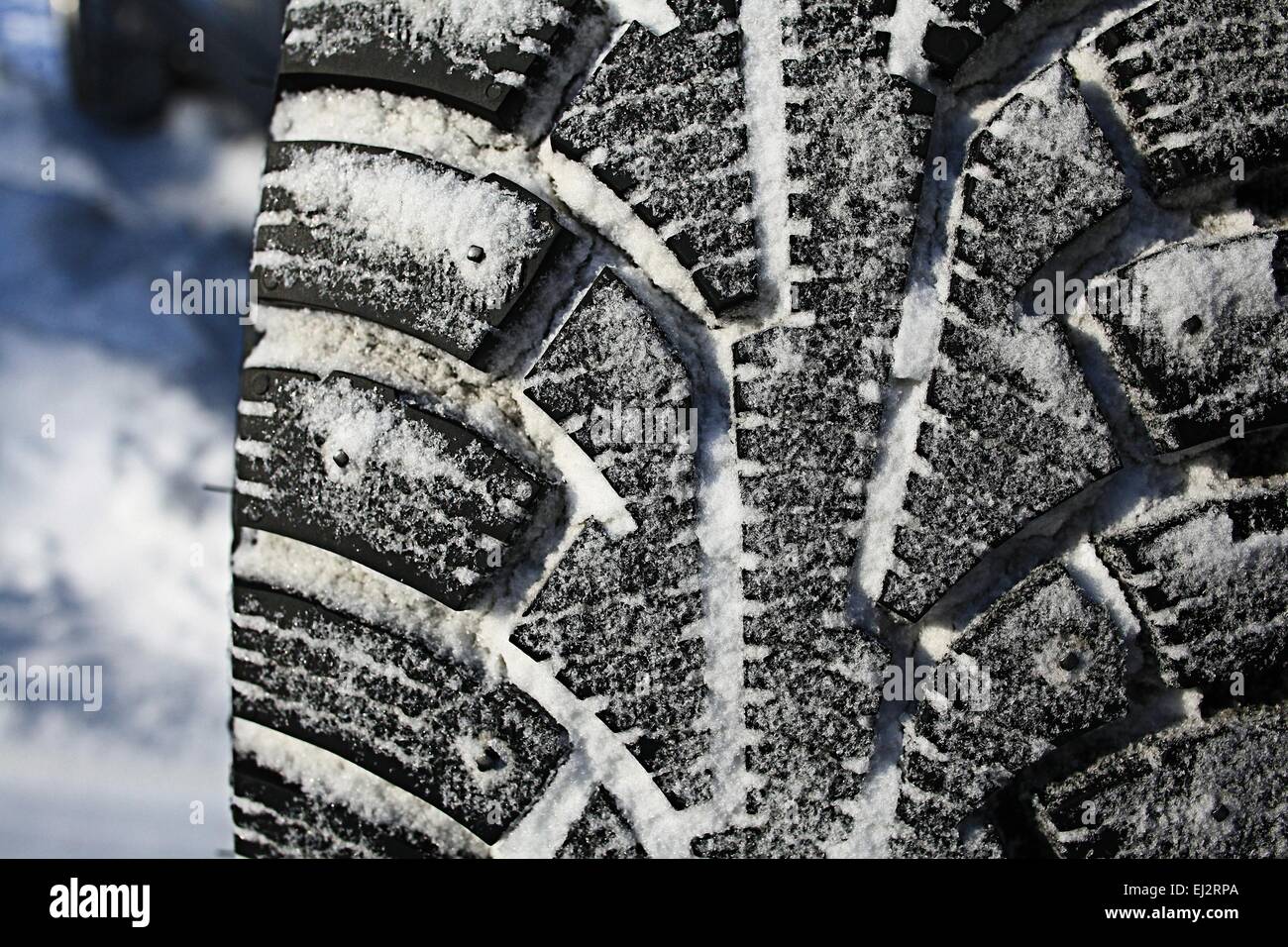 tread wheels Winter studded tires snow Stock Photo Alamy