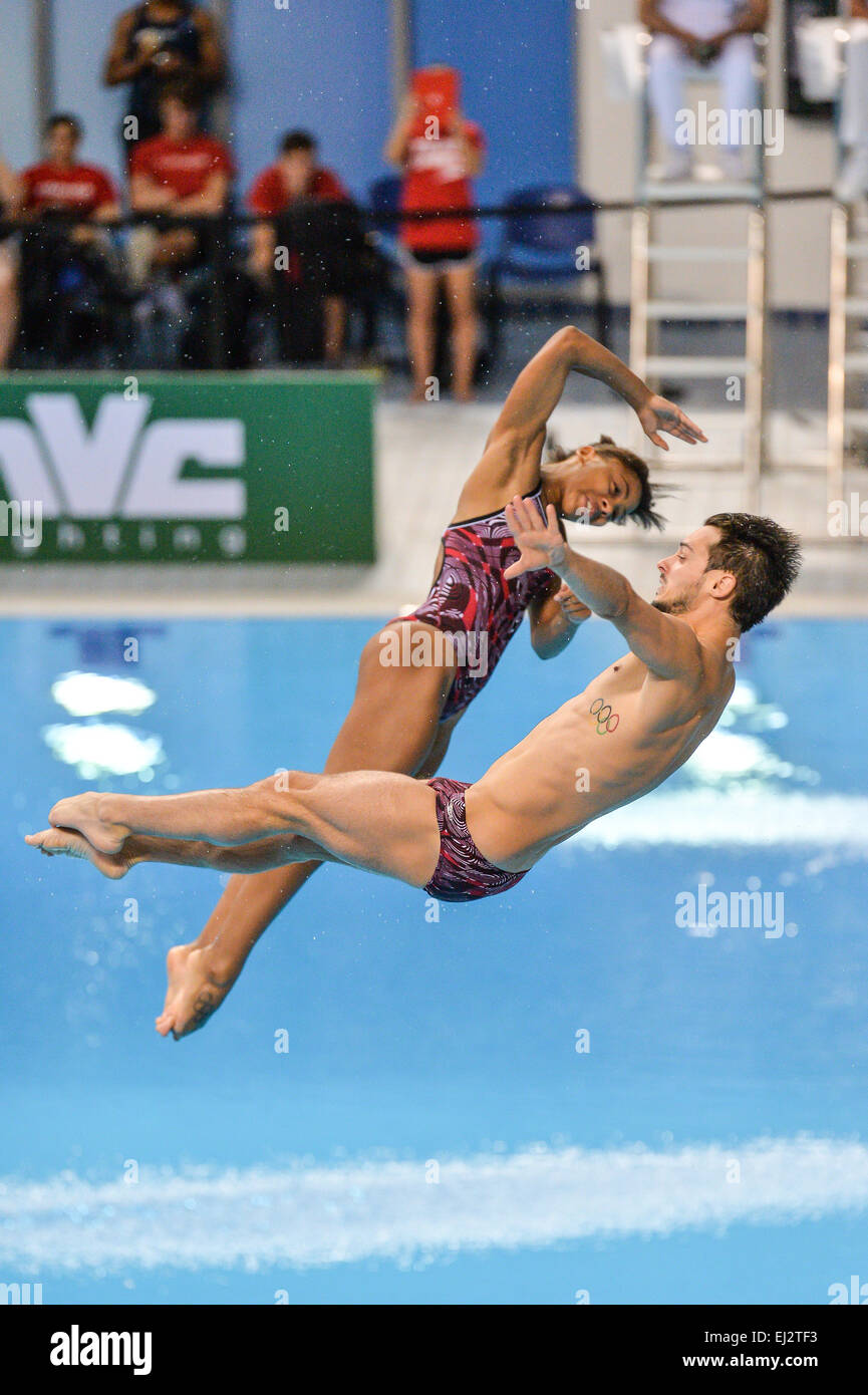 DUBAI, UAE, 20th March 2015. The Canadian duo of Jennifer Abel and Francois ImbeauDulac on their way to silver in the Synchro 3m Springboard World Series gold medal in Dubai. The pair narrowly lost to Chen Aisen and He Zi of China who placed first Credit:  Feroz Khan/Alamy Live News Stock Photo