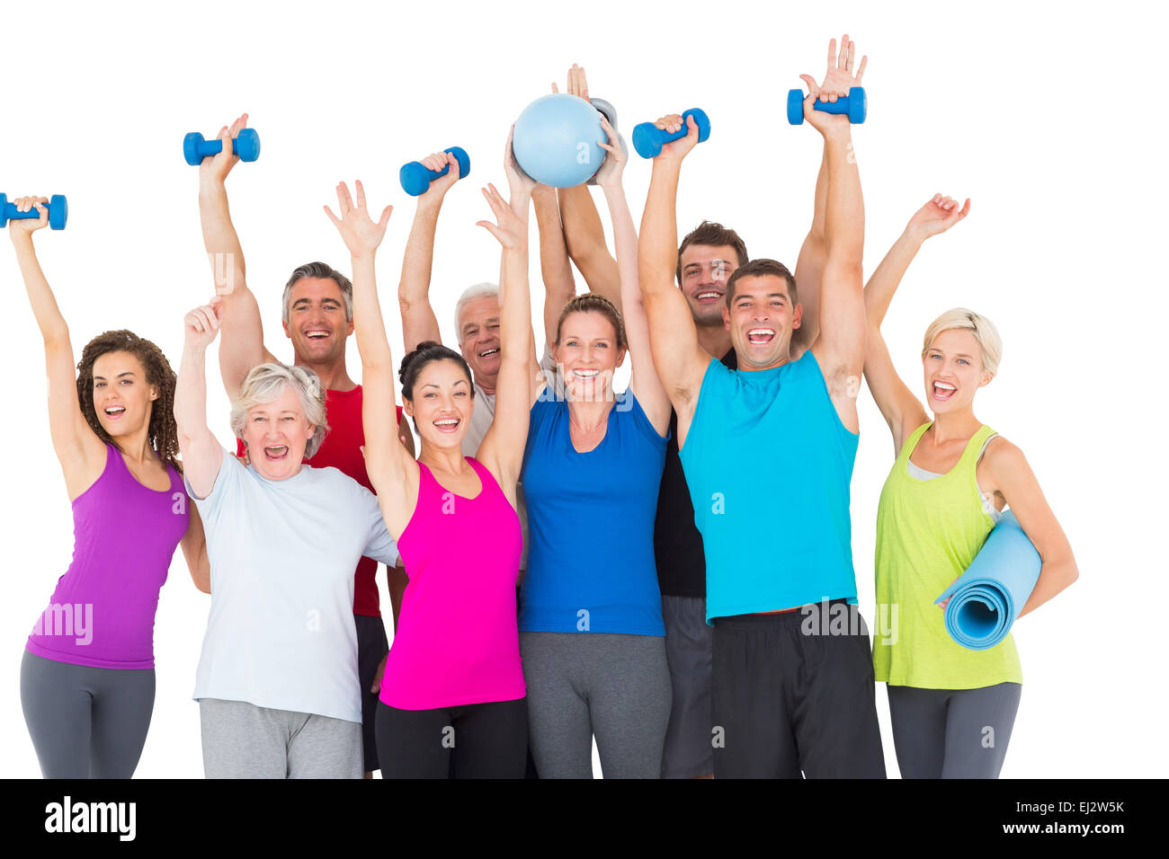 Excited people with exercise equipment raising hands Stock Photo