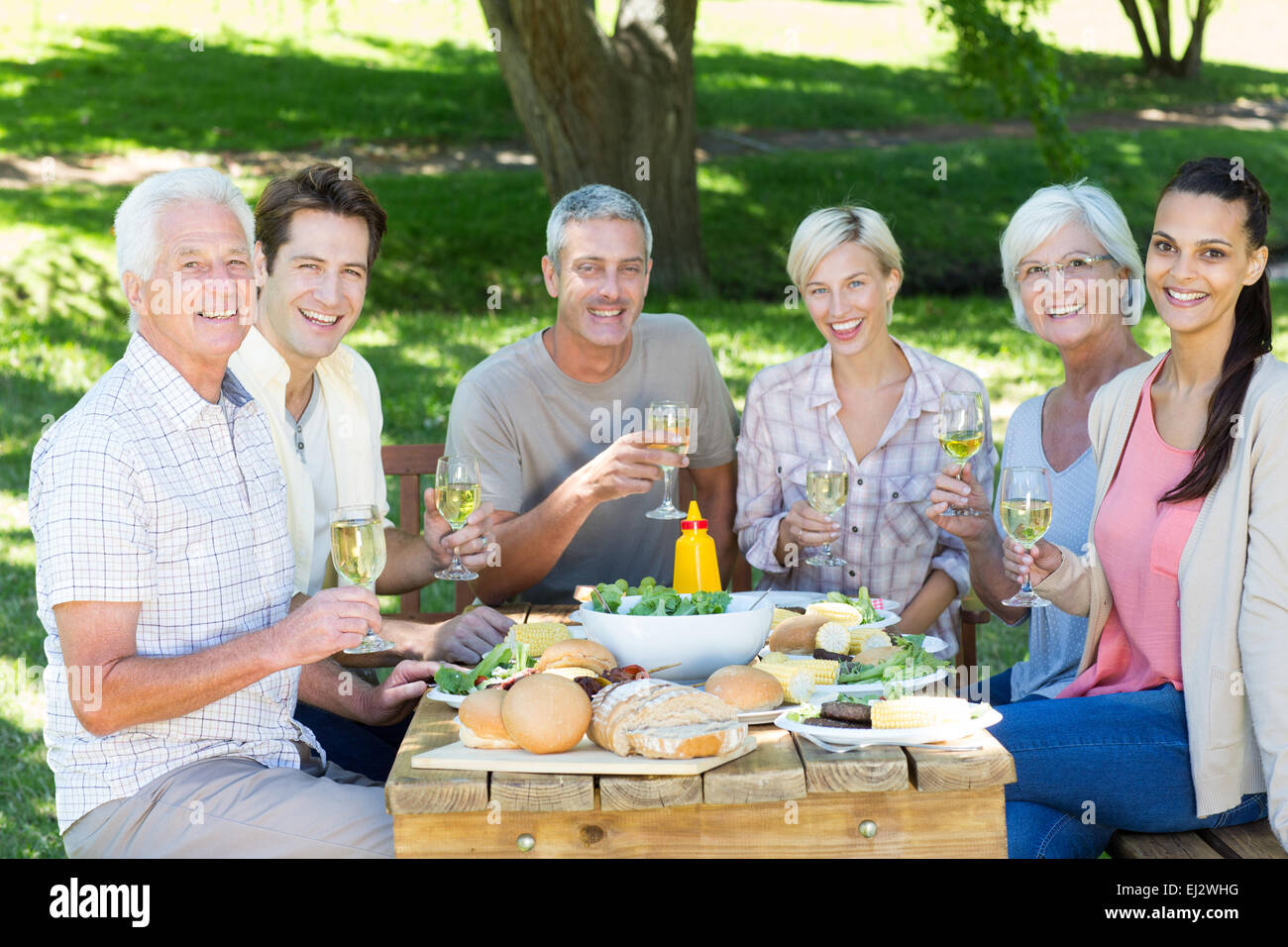 Young family picnic park table hi-res stock photography and images - Alamy