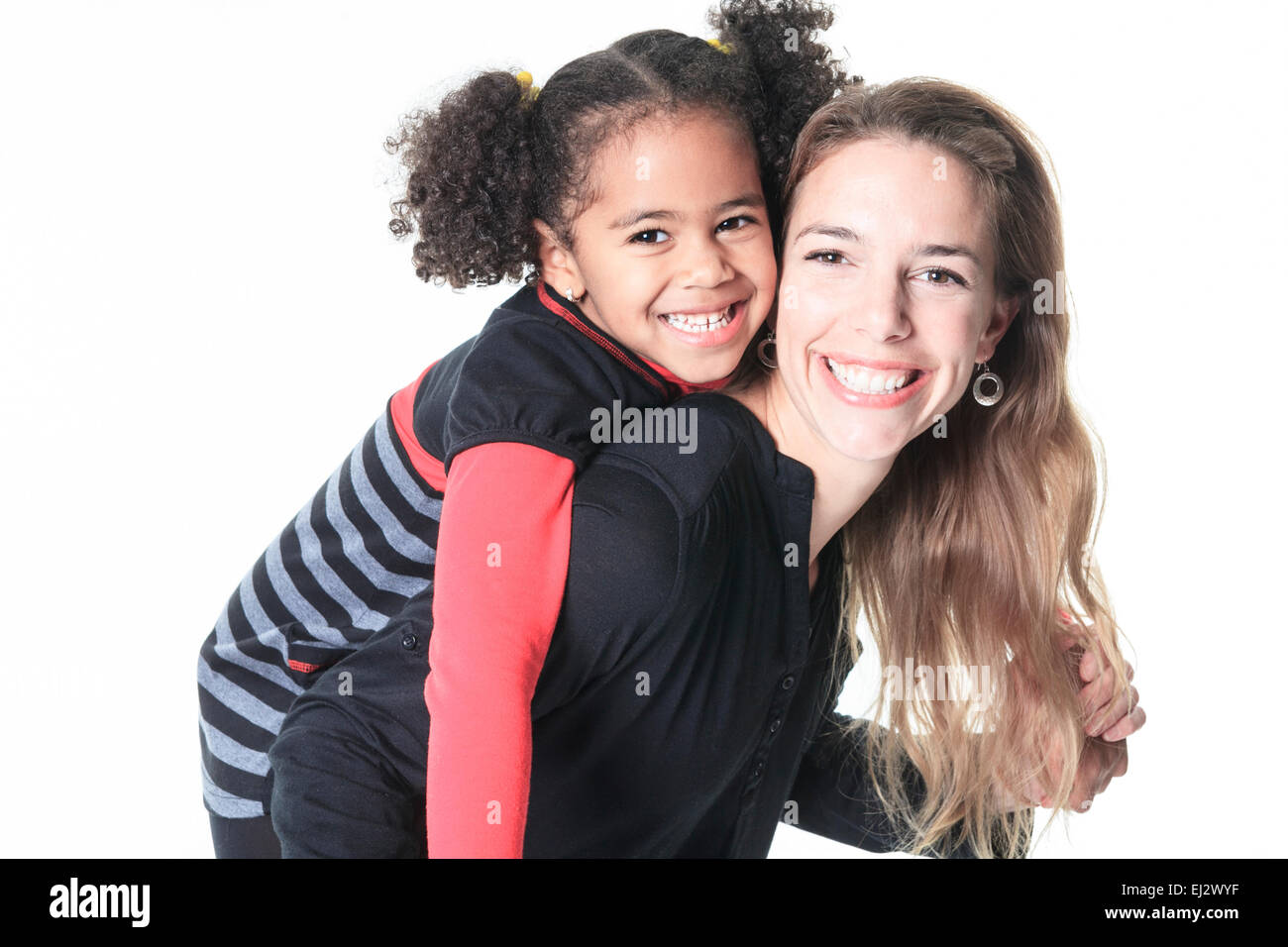 A family posing on a white background studio Stock Photo - Alamy
