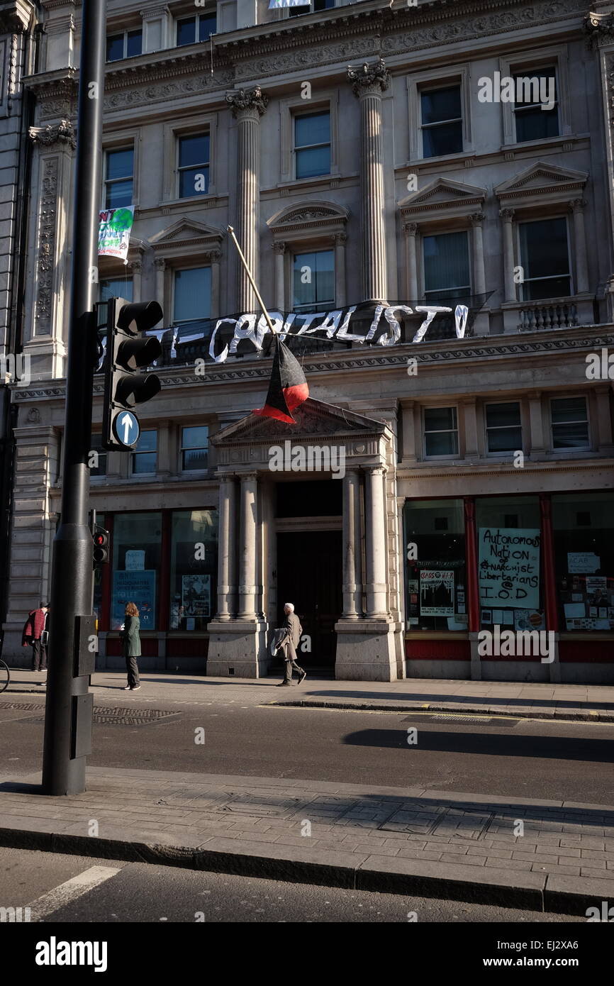London, UK. 20th March, 2015. Squatters calling themselves Autonomous Nation of Anarchist Libertarians (A.N.A.L.) have occupied a building on Pall Mall Credit:  Rachel Megawhat/Alamy Live News Stock Photo