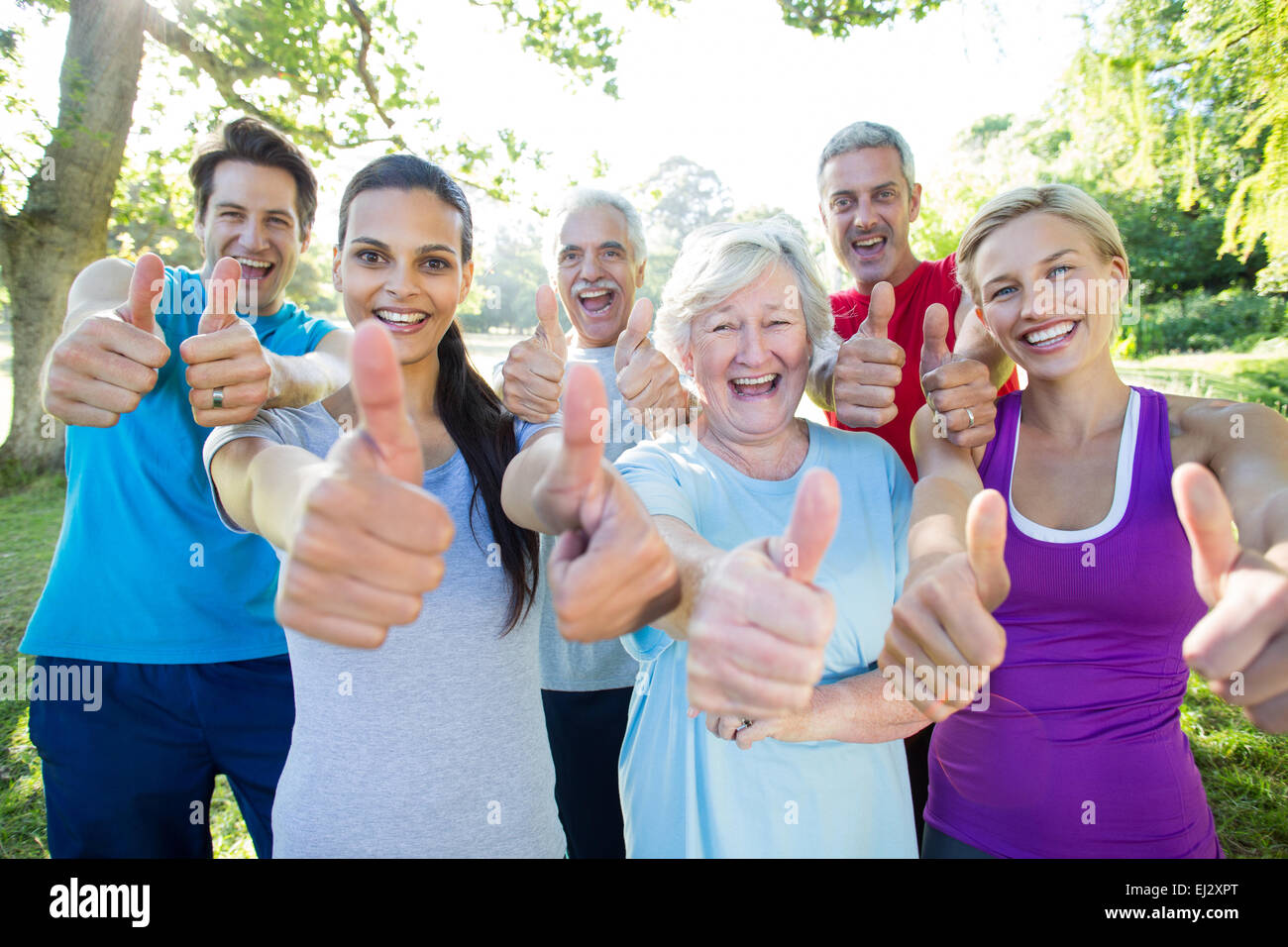 Woman sunshine happy thumbs up hi-res stock photography and images - Alamy