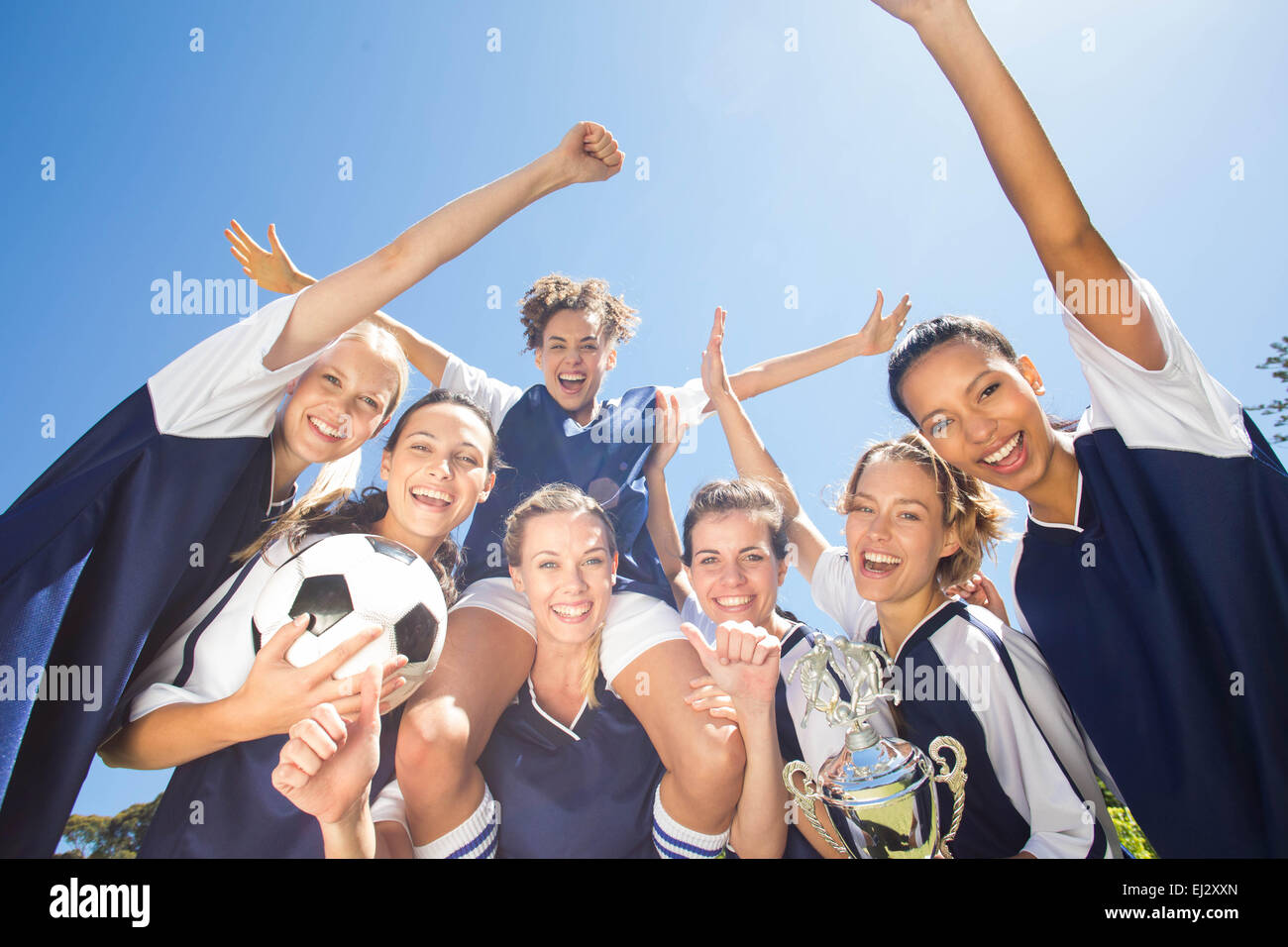 Pretty football players celebrating their win Stock Photo Alamy