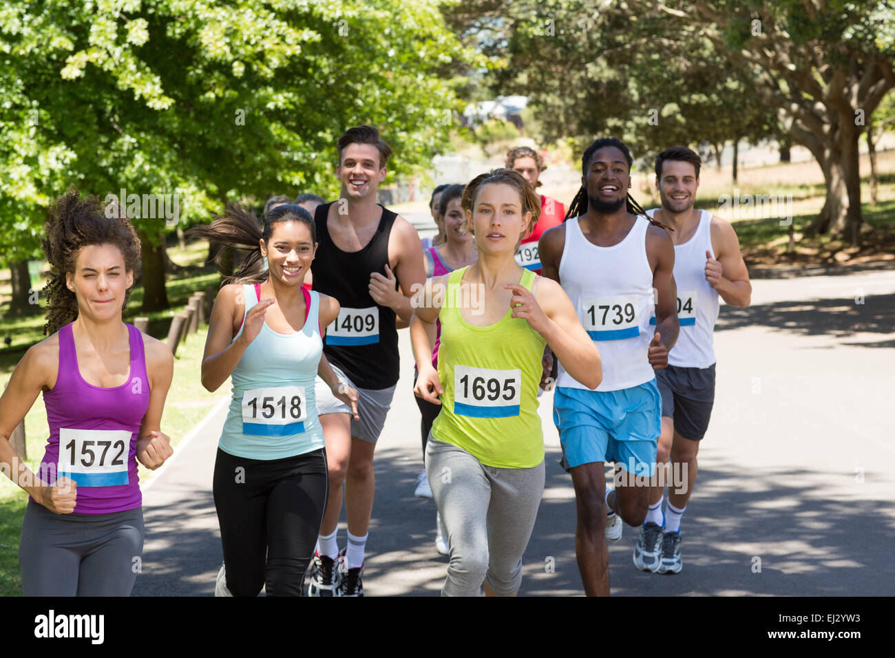 Happy People Running Race In Park Stock Photo Alamy