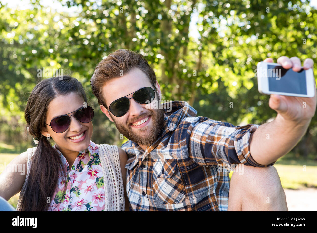 Young couple taking a selfie Stock Photo - Alamy