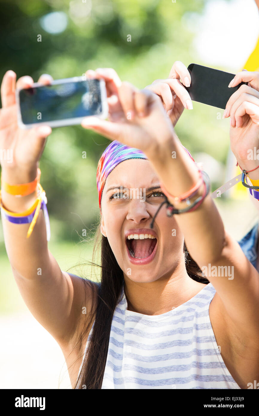 Excited music fan at festival Stock Photo