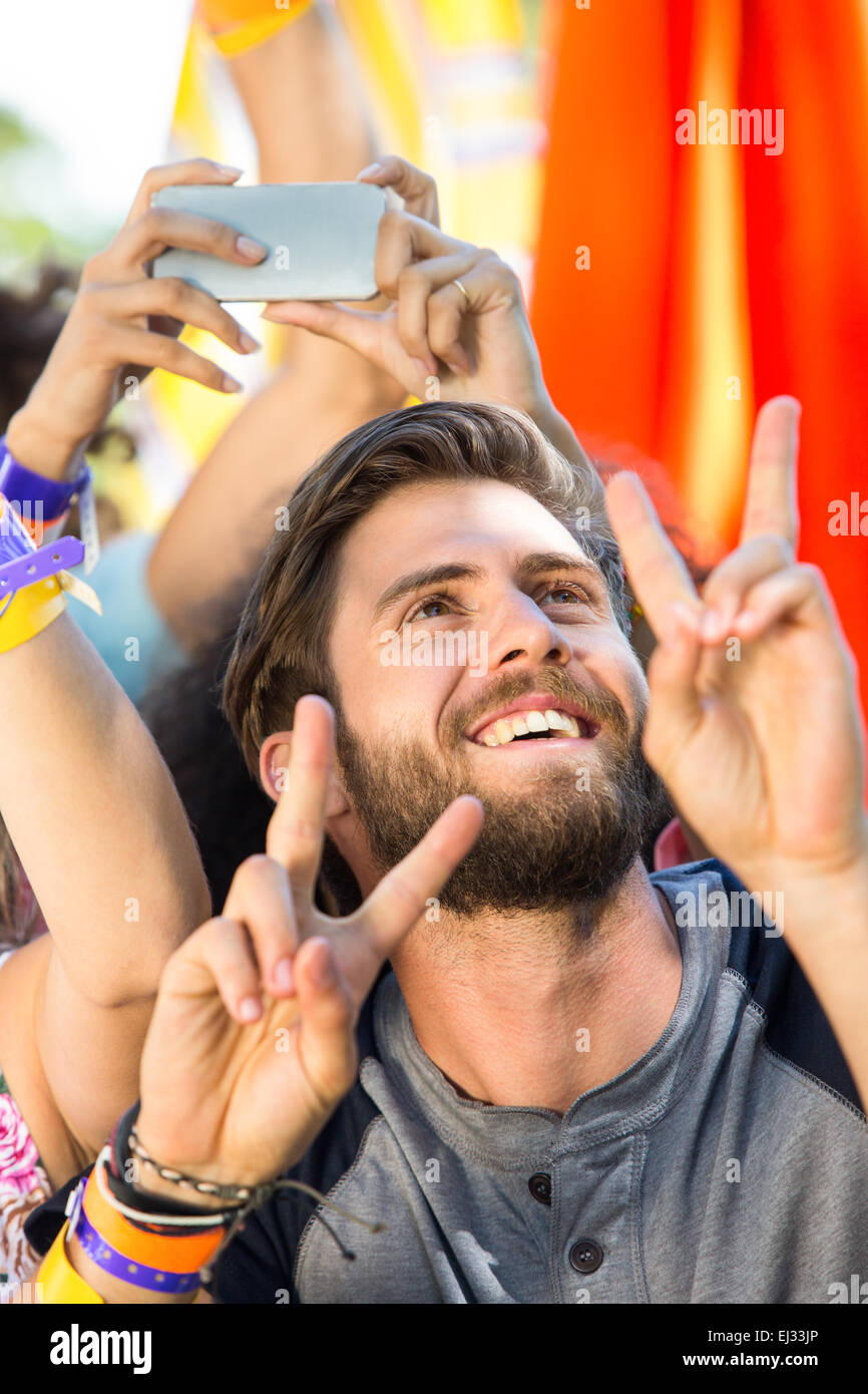 Excited music fan at festival Stock Photo