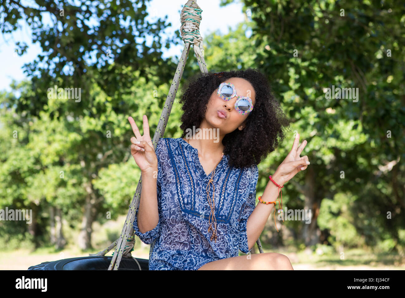 Pretty young woman hand sign hi-res stock photography and images - Alamy
