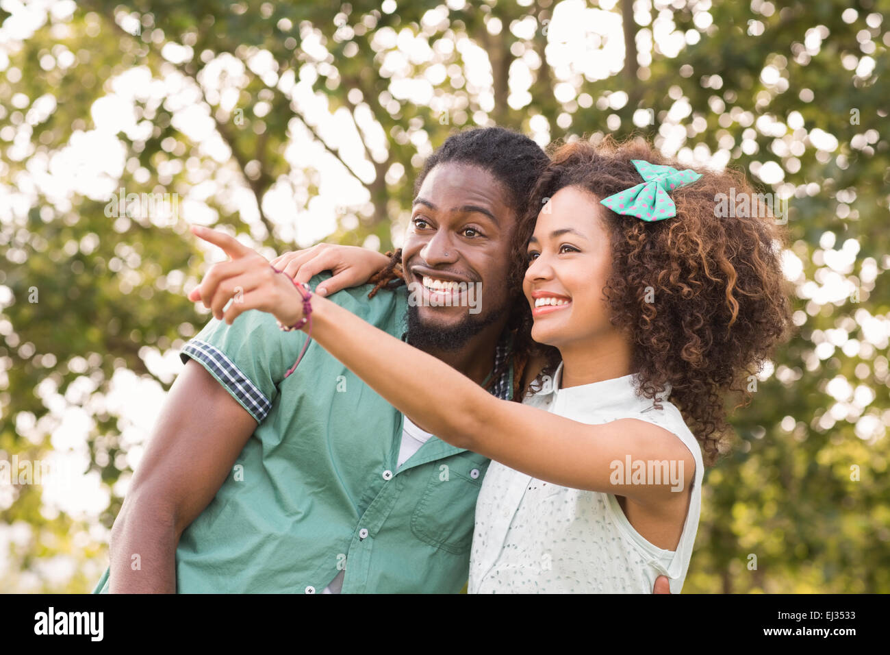 Cute couple in the park Stock Photo - Alamy