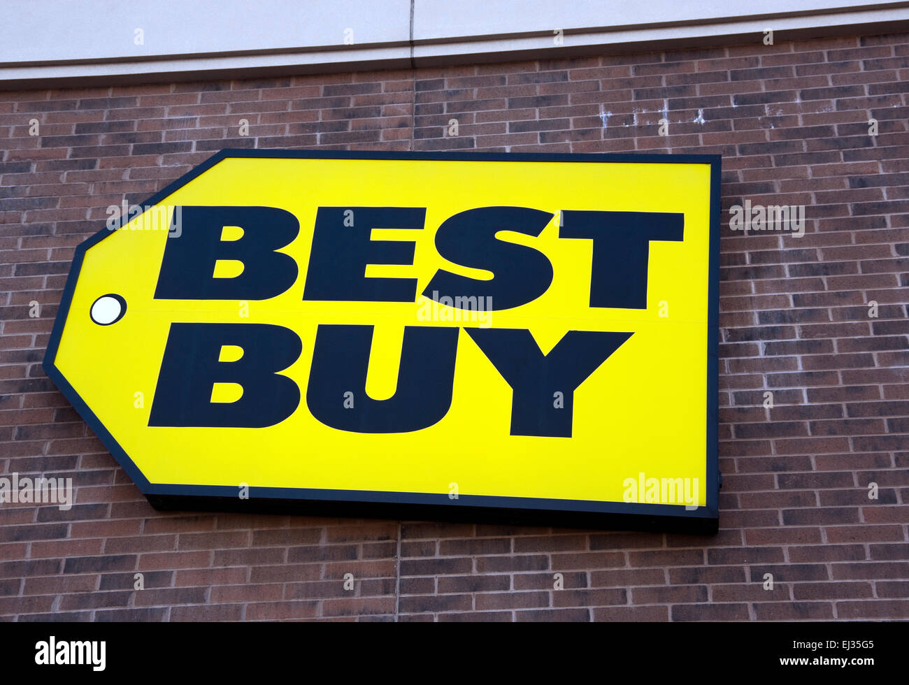 Best Buy, electronics retailer logo sign on brick building Stock Photo