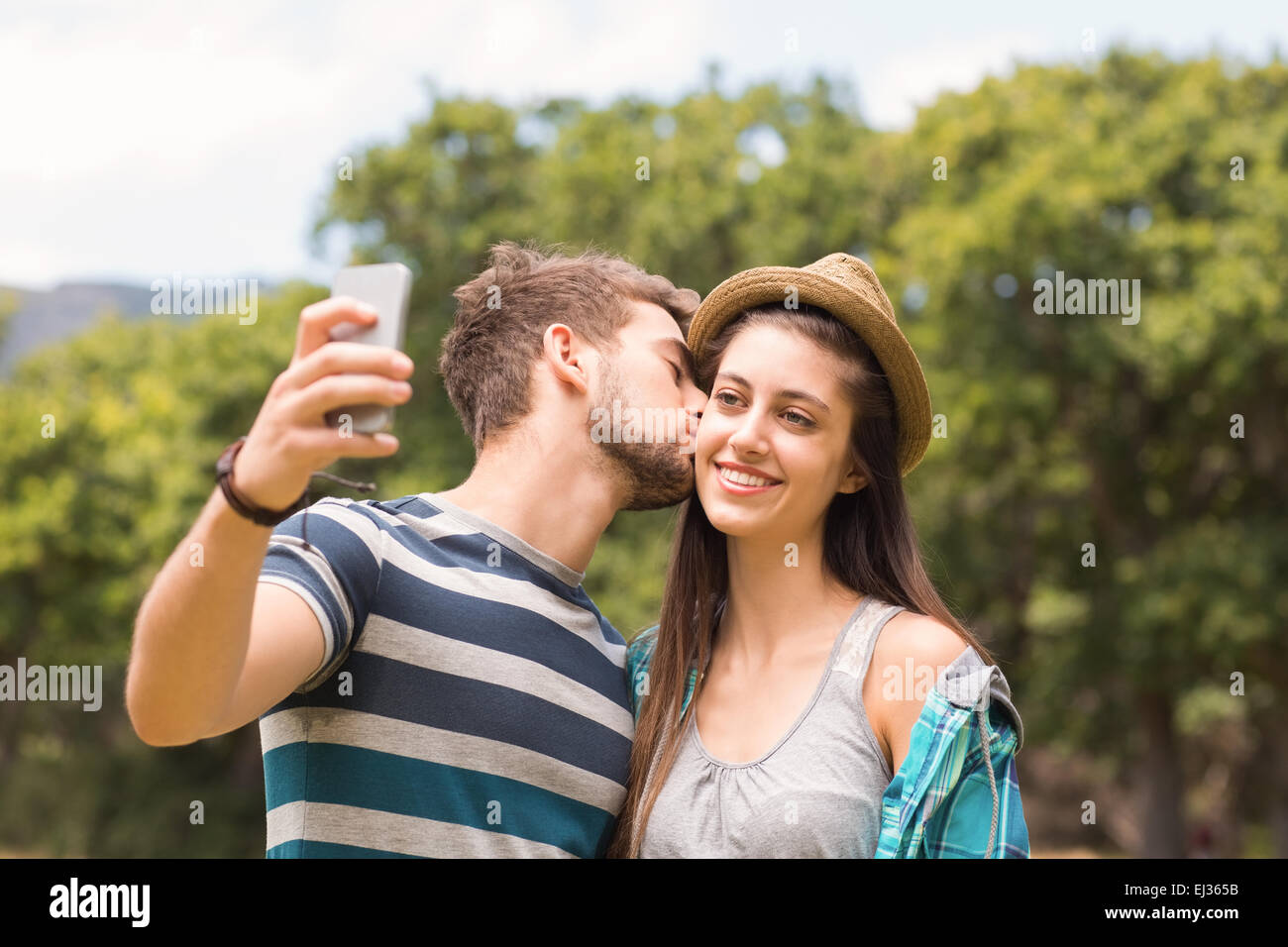 Young couple taking a selfie Stock Photo - Alamy
