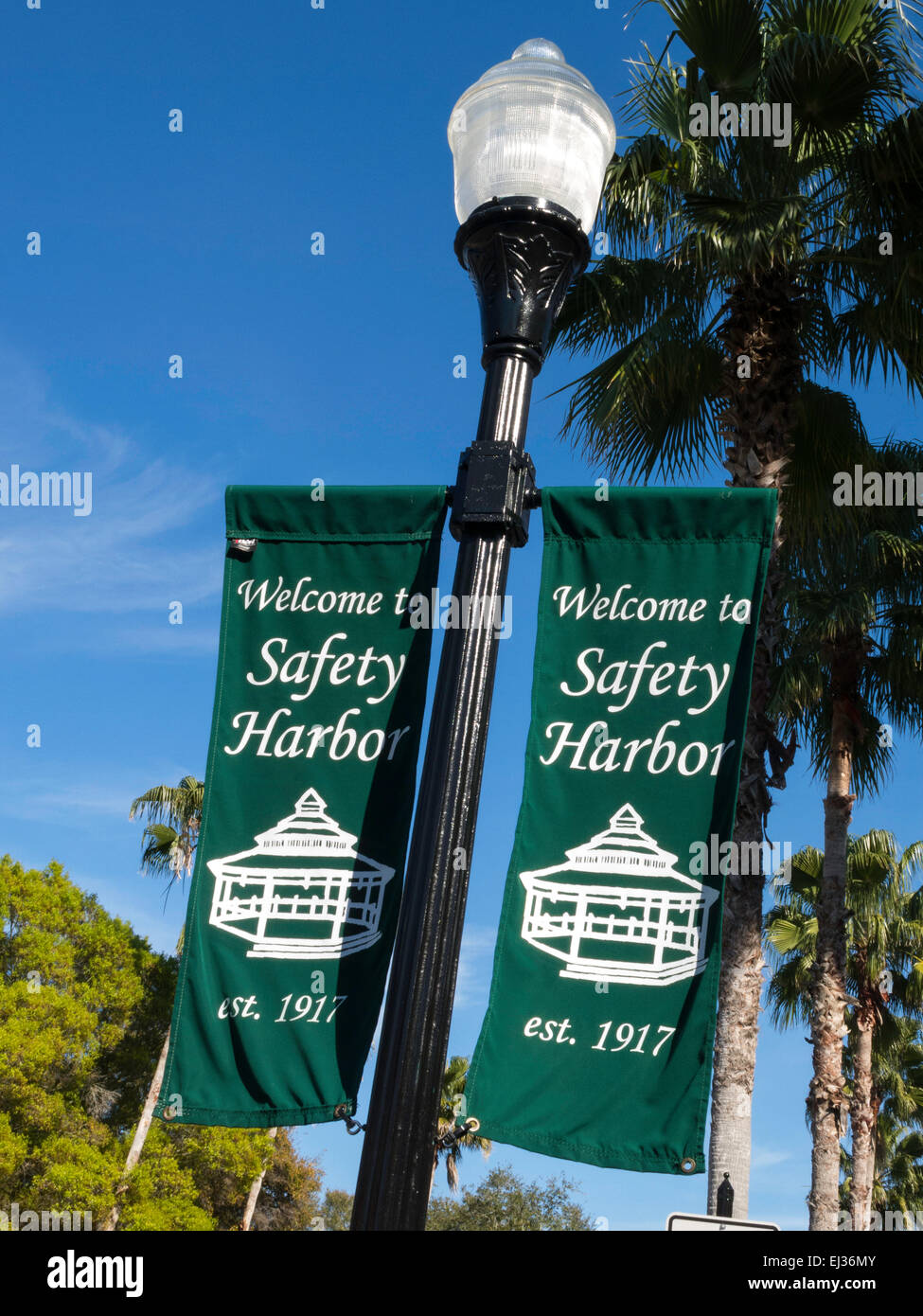 Old Fashioned Street Light with Welcome Banners, Safety Harbor, FL, USA Stock Photo
