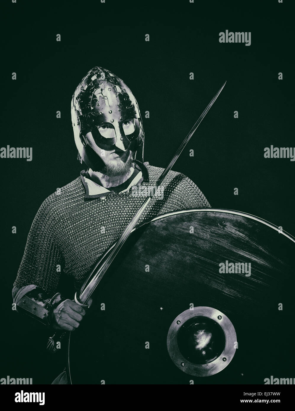 Medieval knight armor with a sword, helmet and shield, black and white ...