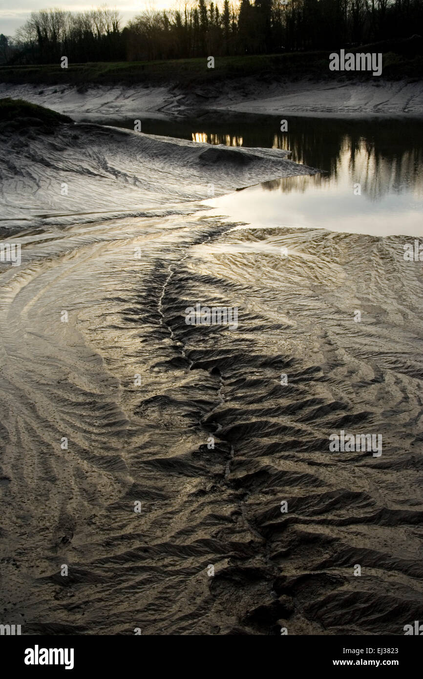 Muddy river bed in the Cumberland Basin area of Bristol. Stock Photo