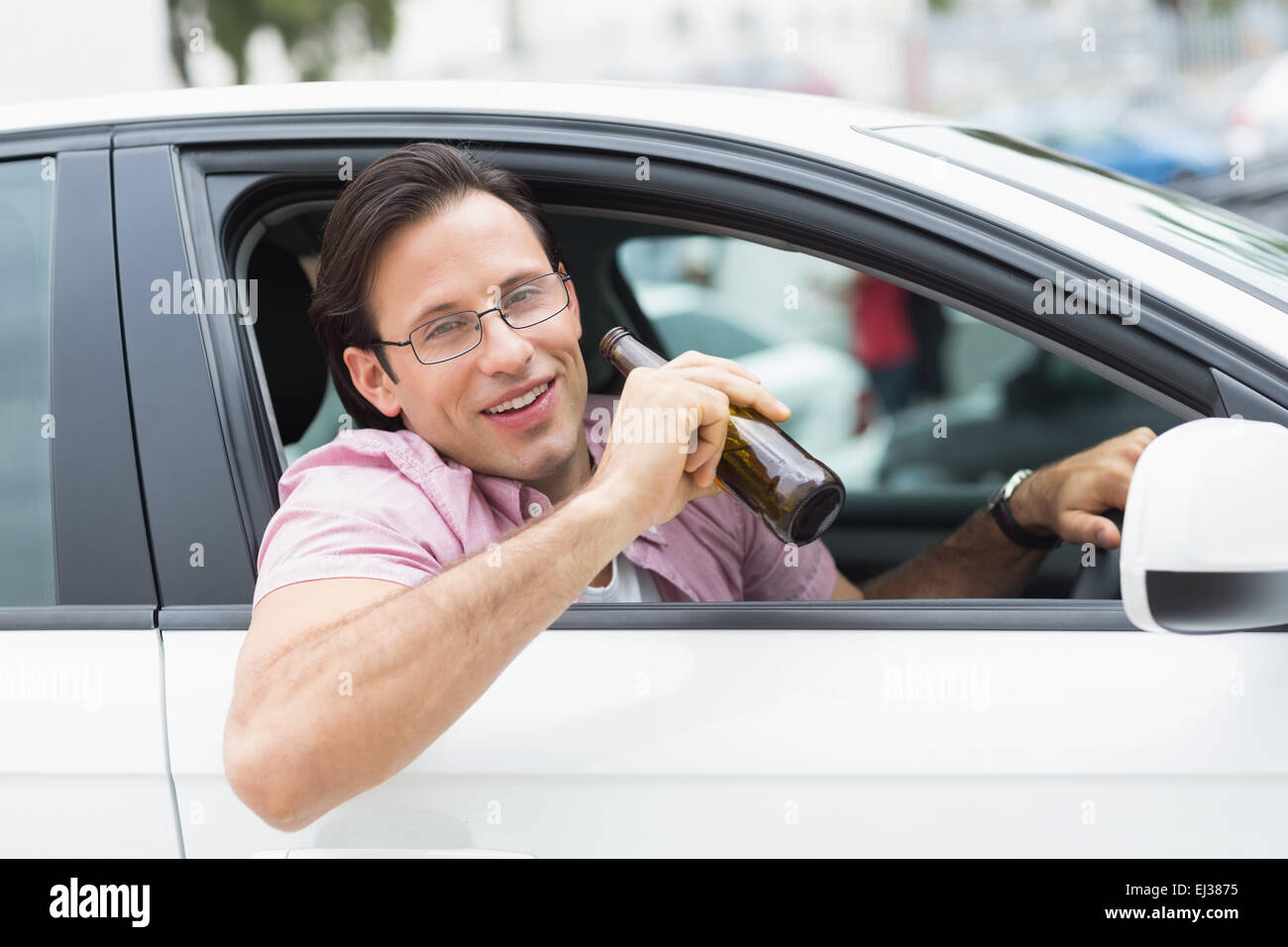 Man drinking beer while driving Stock Photo Alamy