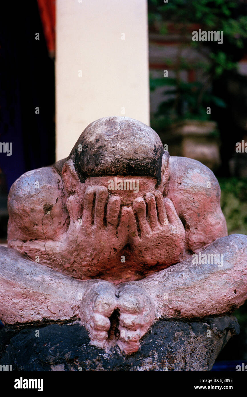 Temple art in Ubud in Bali in Indonesia in Southeast Asia. Culture History Carving Sculpture East Eastern Travel Stock Photo