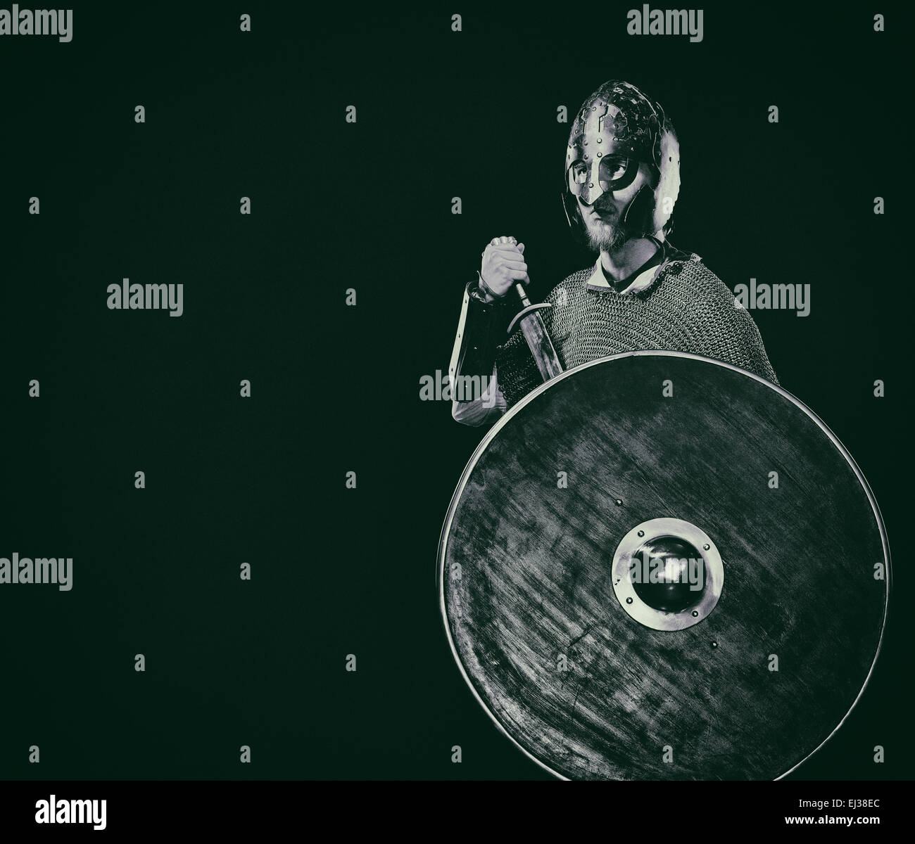 Medieval knight armor with a sword, helmet and shield, black and white ...