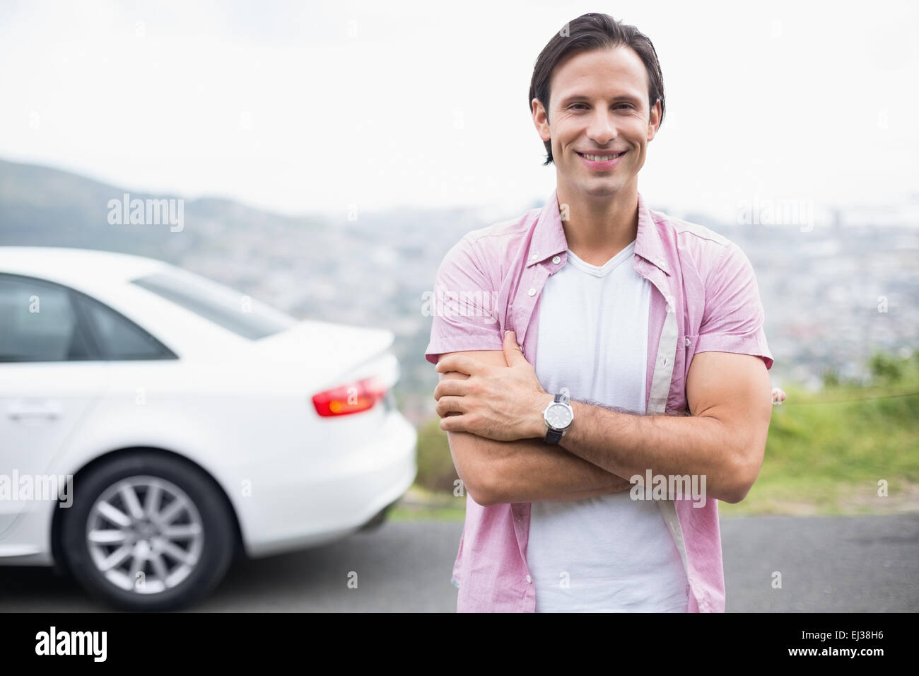 Happy man smiling at the camera Stock Photo - Alamy