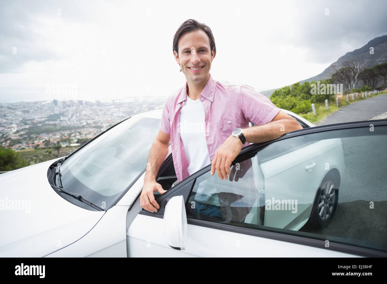 Man smiling at camera Stock Photo - Alamy