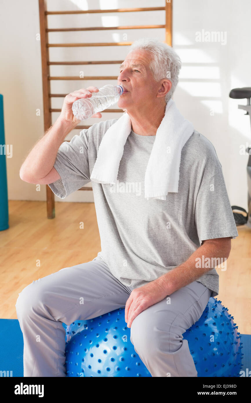 Senior man sitting water bottle hi-res stock photography and images - Alamy