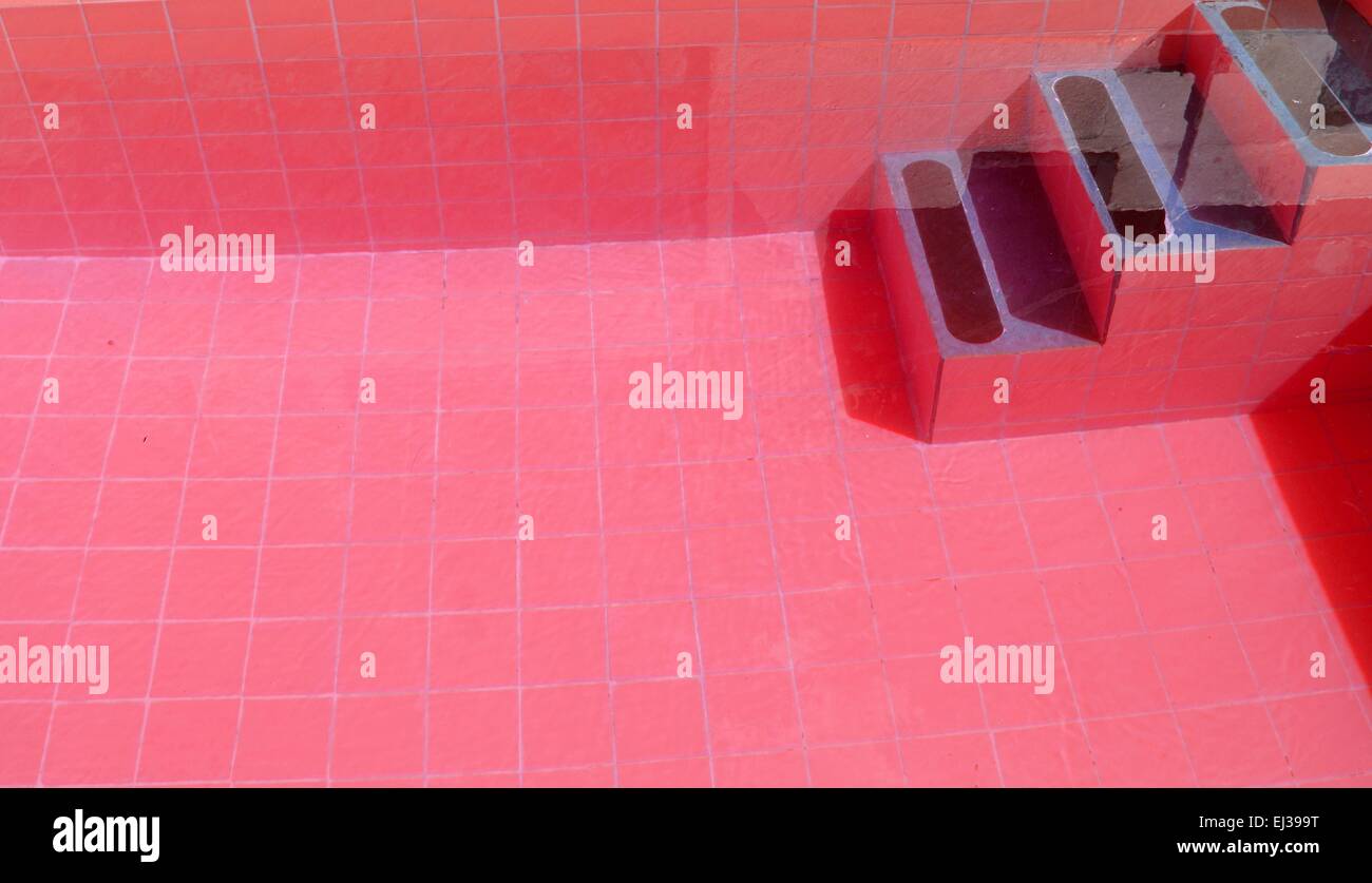 Blue tiles swimming pool stairs hi-res stock photography and images - Alamy